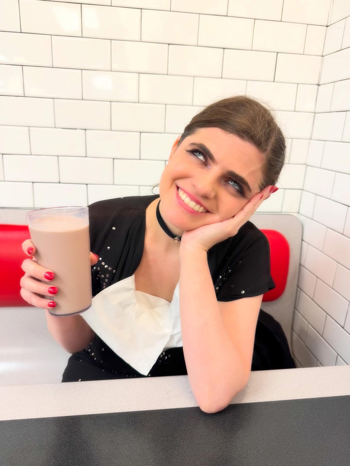 Nettie with a milkshake on the road